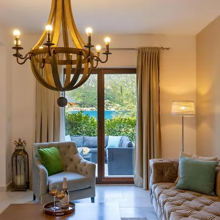 Huma Kotor Bay Hotel And Villas Exterior photo A living room with a chandelier
